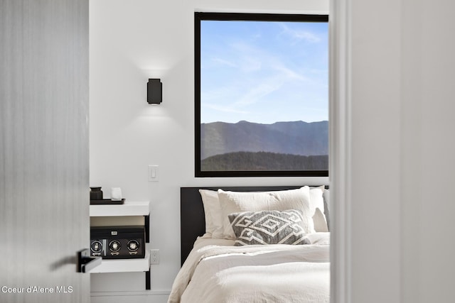 1376 Less Traveled Rd, Sagle, ID 83860 - bedroom featuring a mountain view