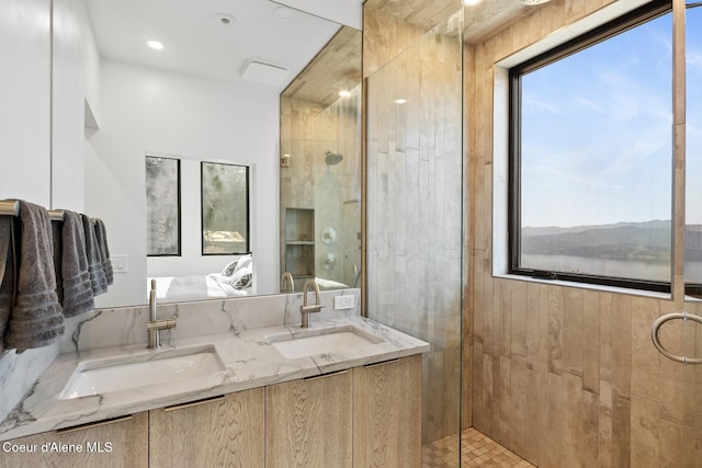1376 Less Traveled Rd, Sagle, ID 83860 - full bathroom with a tile shower, double vanity, and ensuite bathroom