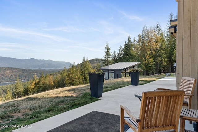 1376 Less Traveled Rd, Sagle, ID 83860 - view of patio / terrace featuring a mountain view