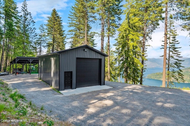 1376 Less Traveled Rd, Sagle, ID 83860 - detached garage featuring driveway