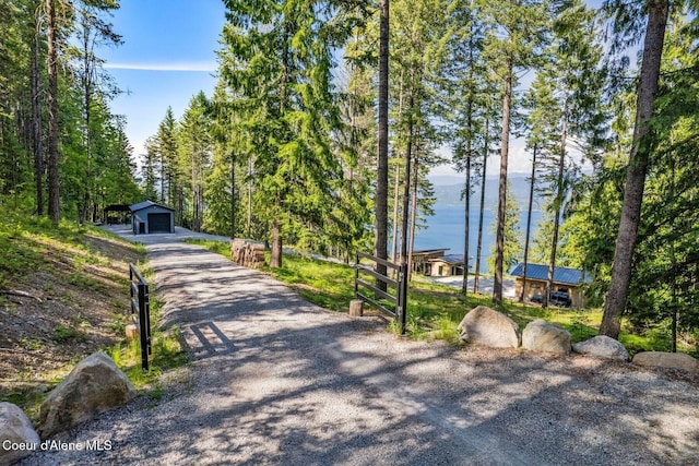 1376 Less Traveled Rd, Sagle, ID 83860 - view of dirt / gravel driveway featuring a water view