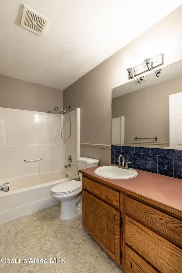 405 W 22nd Ave, Post Falls, ID 83854 - bathroom with vanity, shower / bath combination, and backsplash