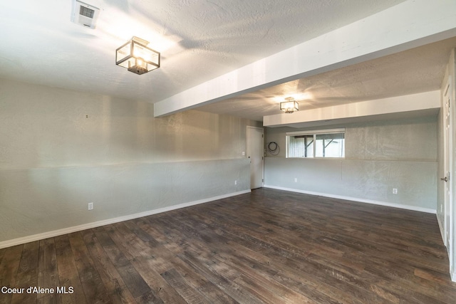 405 W 22nd Ave, Post Falls, ID 83854 - spare room featuring hardwood / wood-style flooring and a textured ceiling