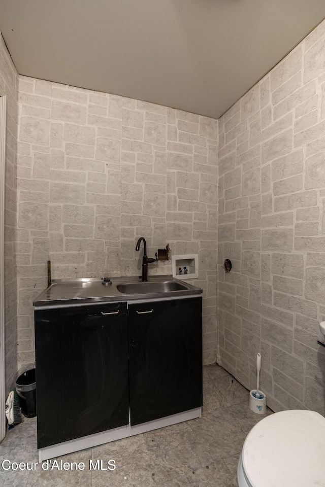 405 W 22nd Ave, Post Falls, ID 83854 - bathroom with vanity and tile walls