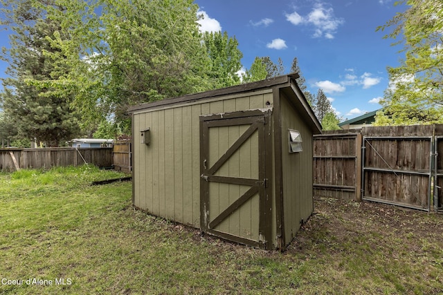 405 W 22nd Ave, Post Falls, ID 83854 - view of shed featuring a fenced backyard