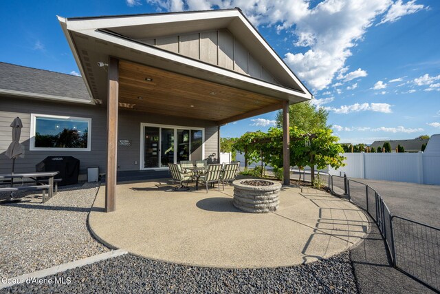 1222 W Tamarindo Ln, Hayden, ID 83835 - view of patio with a fire pit and grilling area