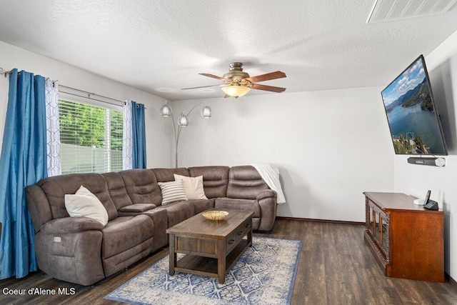 7090 N Epervier Ln, Coeur Dalene, ID 83815 - living room with wood finished floors, a ceiling fan, and a textured ceiling