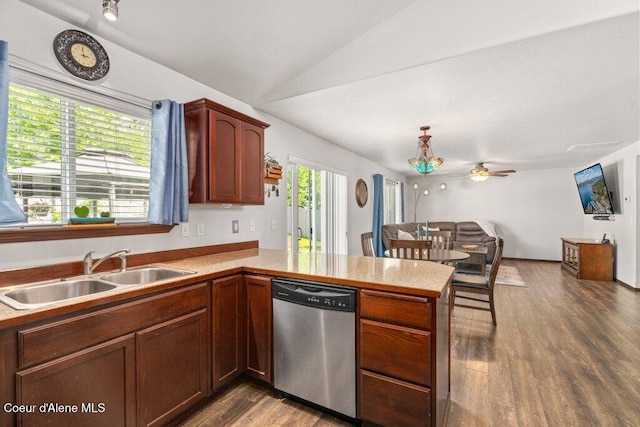 7090 N Epervier Ln, Coeur Dalene, ID 83815 - kitchen with dishwasher, a peninsula, dark wood-style flooring, ceiling fan, and light countertops