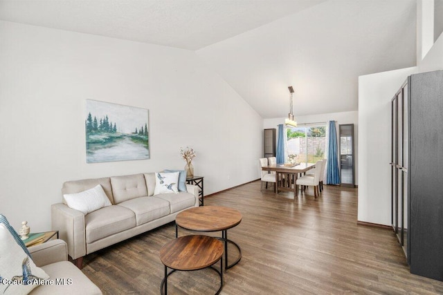 7090 N Epervier Ln, Coeur Dalene, ID 83815 - living room with wood finished floors and vaulted ceiling