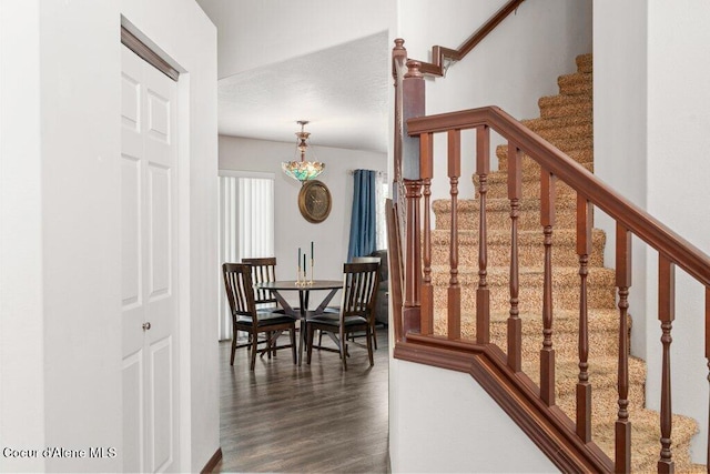 7090 N Epervier Ln, Coeur Dalene, ID 83815 - stairway with wood finished floors