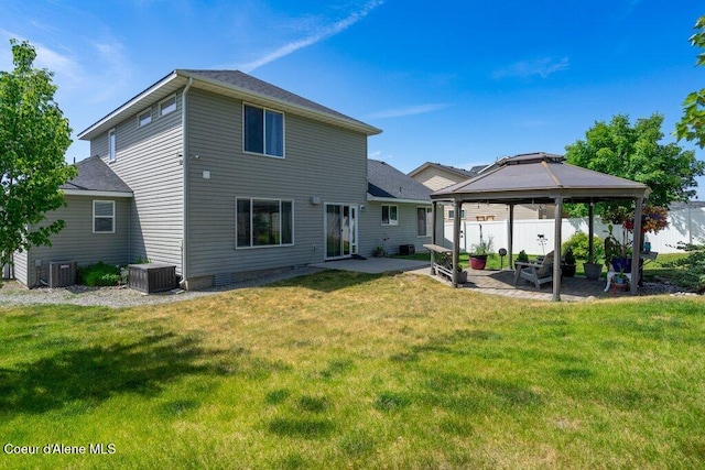 7090 N Epervier Ln, Coeur Dalene, ID 83815 - rear view of property featuring a gazebo, a patio, and a lawn