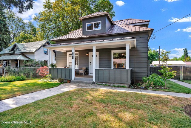 310 W Linden Ave, Coeur Dalene, ID 83814 - bungalow-style home featuring covered porch and a metal roof