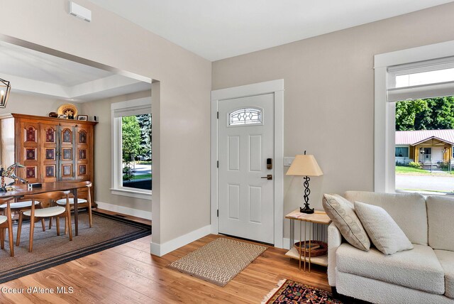 310 W Linden Ave, Coeur Dalene, ID 83814 - foyer with healthy amount of natural light and light wood-style floors