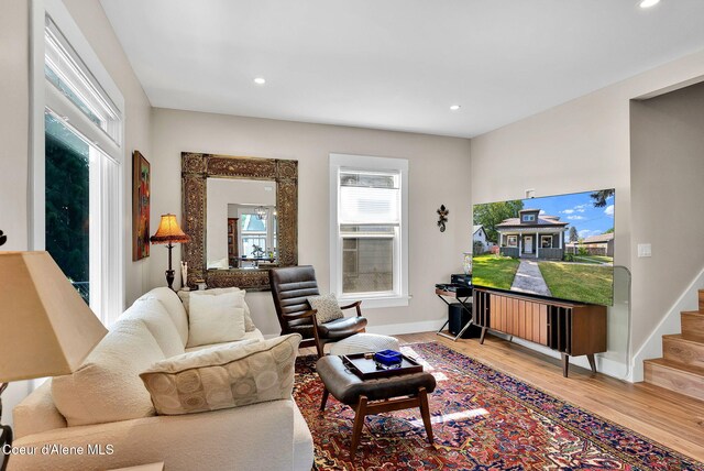 310 W Linden Ave, Coeur Dalene, ID 83814 - living room with wood finished floors, recessed lighting, and stairway