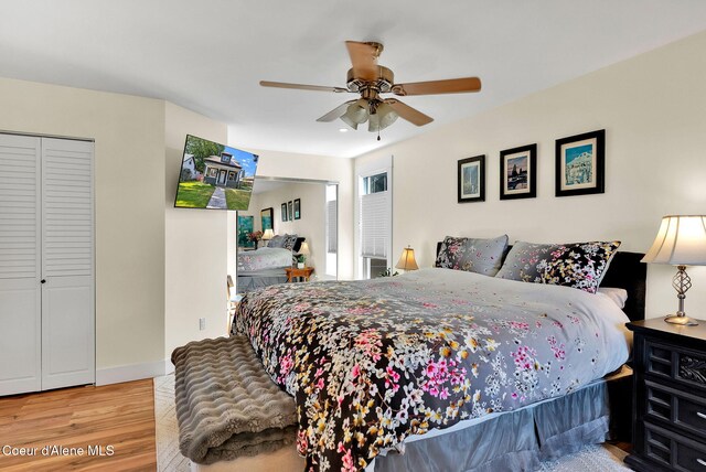 310 W Linden Ave, Coeur Dalene, ID 83814 - bedroom with wood finished floors, ceiling fan, and a closet