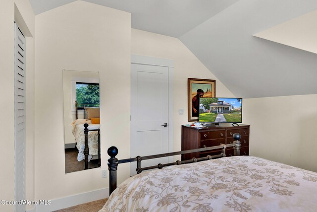 310 W Linden Ave, Coeur Dalene, ID 83814 - bedroom featuring lofted ceiling and baseboards