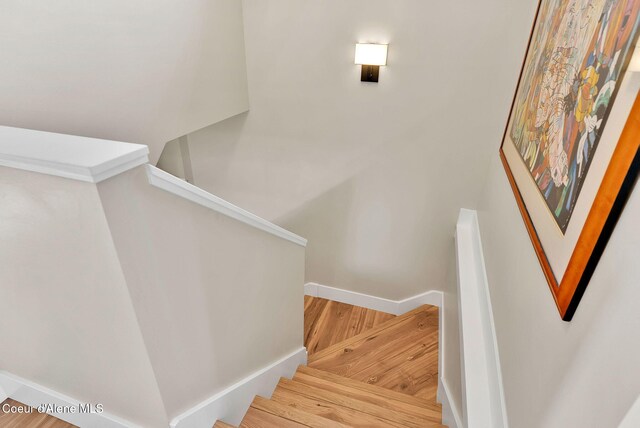310 W Linden Ave, Coeur Dalene, ID 83814 - stairway with wood finished floors and baseboards