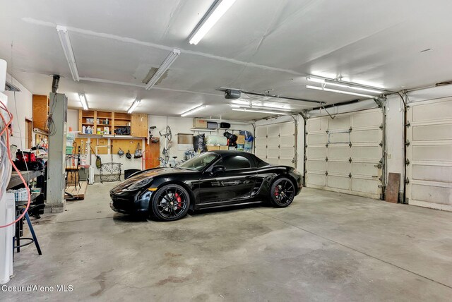 310 W Linden Ave, Coeur Dalene, ID 83814 - garage featuring a garage door opener