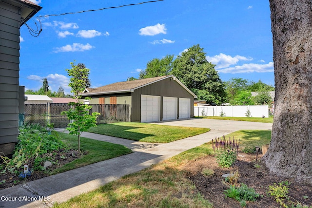 310 W Linden Ave, Coeur Dalene, ID 83814 - view of yard featuring a detached garage