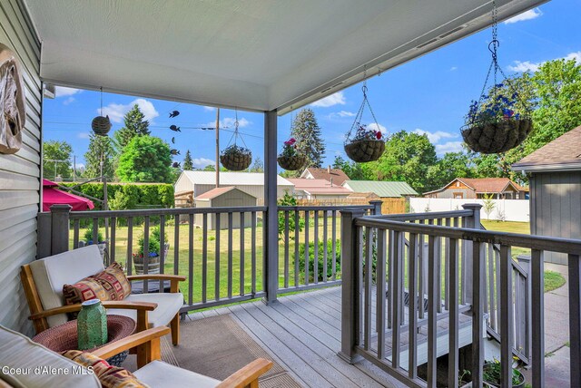 310 W Linden Ave, Coeur Dalene, ID 83814 - deck featuring a storage unit