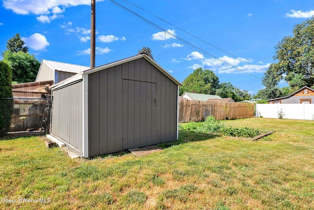 310 W Linden Ave, Coeur Dalene, ID 83814 - view of shed with a fenced backyard