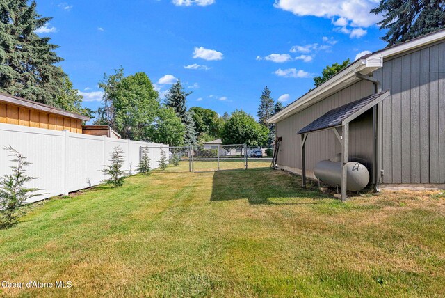 310 W Linden Ave, Coeur Dalene, ID 83814 - view of yard with a gate