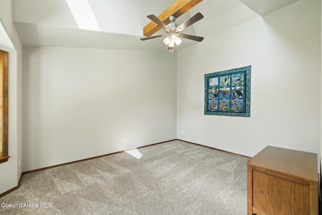699 W Ranch Ct, Rathdrum, ID 83858 - empty room with light colored carpet, ceiling fan, a skylight, and lofted ceiling