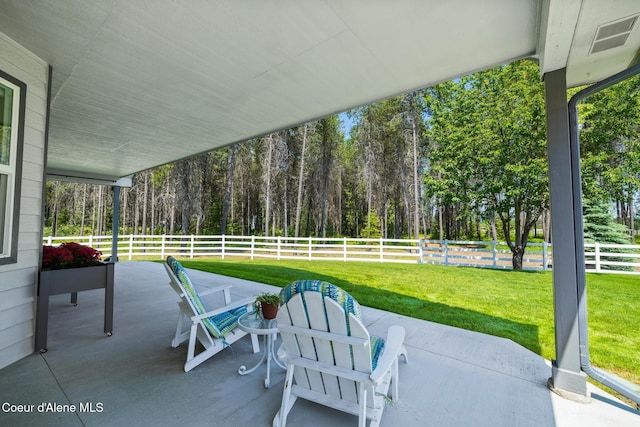 699 W Ranch Ct, Rathdrum, ID 83858 - fenced backyard with a patio