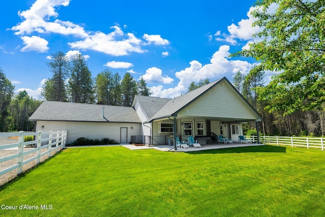 699 W Ranch Ct, Rathdrum, ID 83858 - rear view of house featuring a patio area and a fenced backyard
