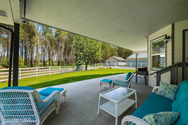 699 W Ranch Ct, Rathdrum, ID 83858 - fenced backyard featuring a patio and view of scattered trees