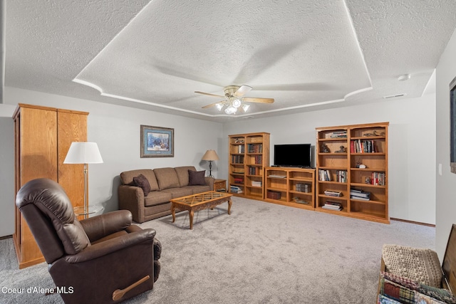 699 W Ranch Ct, Rathdrum, ID 83858 - living room featuring a textured ceiling, ceiling fan, and carpet flooring