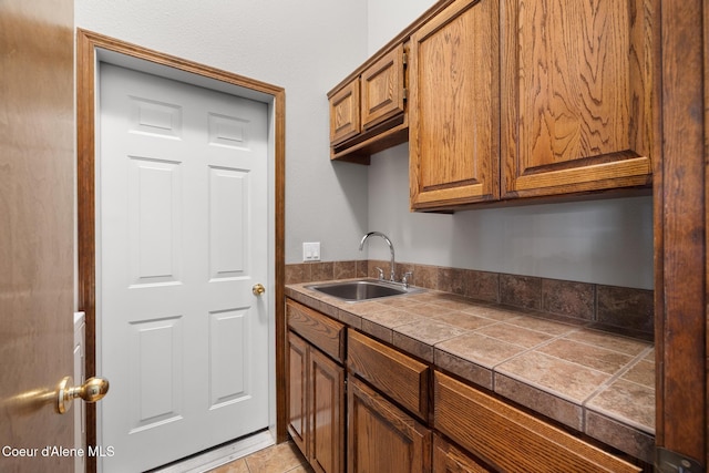 699 W Ranch Ct, Rathdrum, ID 83858 - kitchen with a sink and brown cabinets