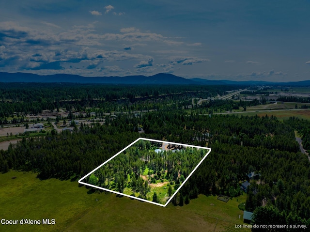 699 W Ranch Ct, Rathdrum, ID 83858 - aerial view of property's location featuring mountains and property parcel outlined