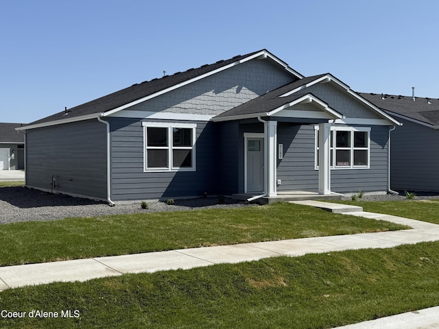 5103 E Rigel Ln, Post Falls, ID 83854 - view of front of home featuring a front yard