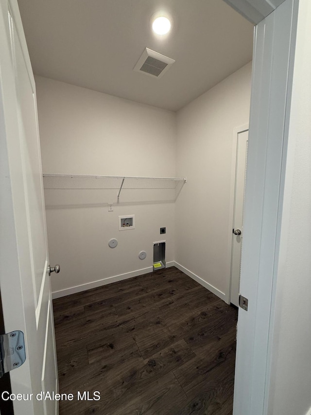 5103 E Rigel Ln, Post Falls, ID 83854 - washroom with hookup for a gas dryer, dark wood-type flooring, hookup for a washing machine, and hookup for an electric dryer