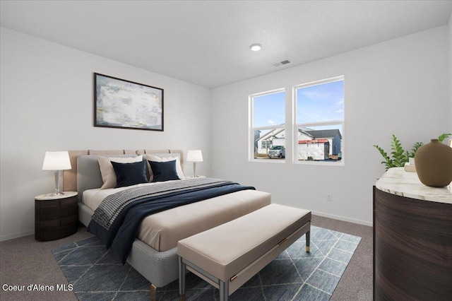 5103 E Norma Ave, Post Falls, ID 83854 - bedroom featuring dark colored carpet and baseboards