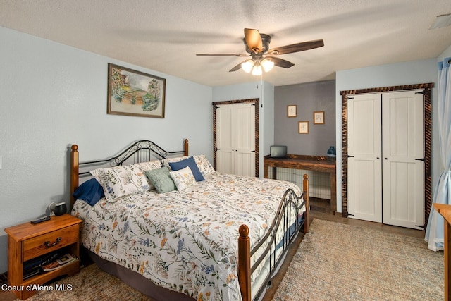 4119 Colburn Culver, Sandpoint, ID 83864 - bedroom featuring ceiling fan and a textured ceiling