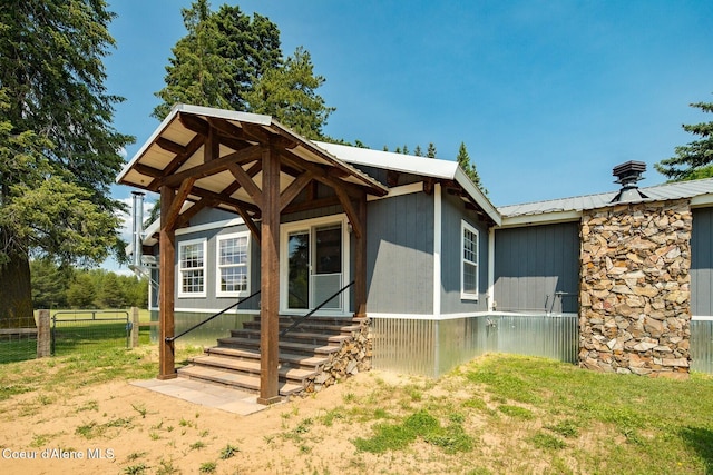 4119 Colburn Culver, Sandpoint, ID 83864 - view of front facade featuring a metal roof and entry steps