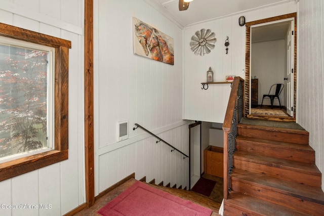 4119 Colburn Culver, Sandpoint, ID 83864 - staircase featuring crown molding and a decorative wall