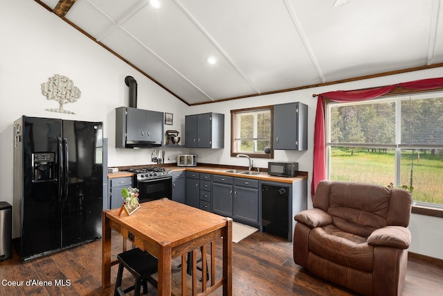 4119 Colburn Culver, Sandpoint, ID 83864 - kitchen with black appliances, gray cabinetry, dark wood-style flooring, under cabinet range hood, and recessed lighting