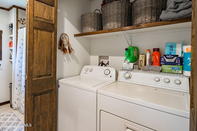 4119 Colburn Culver, Sandpoint, ID 83864 - laundry area with washing machine and clothes dryer and light tile patterned floors