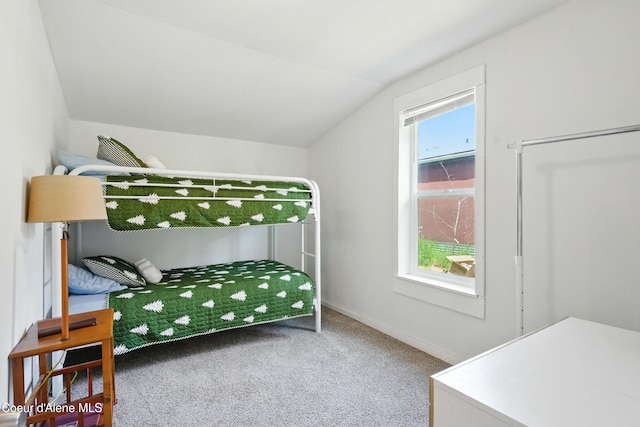 279 Birch Ave, Ponderay, ID 83852 - carpeted bedroom featuring vaulted ceiling