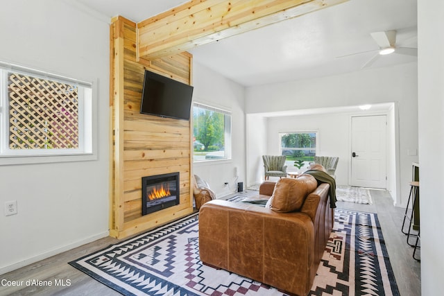 279 Birch Ave, Ponderay, ID 83852 - living area with wood finished floors, a fireplace, and ceiling fan