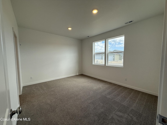 5149 E Rigel Ln, Post Falls, ID 83854 - unfurnished room featuring dark carpet and recessed lighting