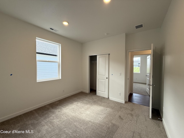 5149 E Rigel Ln, Post Falls, ID 83854 - unfurnished bedroom featuring carpet floors, a closet, and recessed lighting