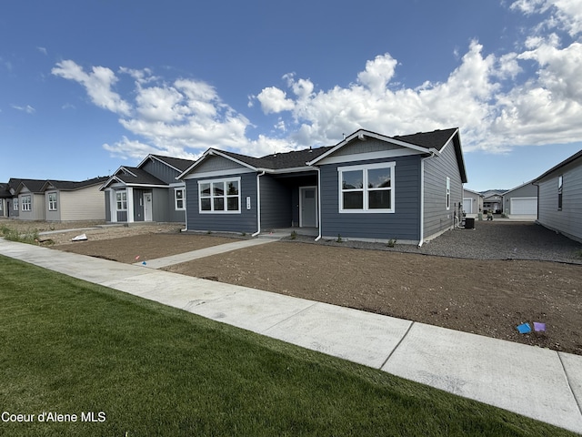 5149 E Rigel Ln, Post Falls, ID 83854 - single story home featuring a front lawn