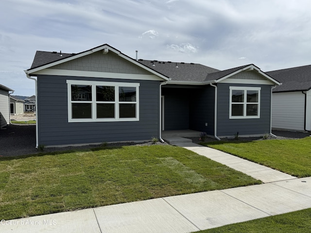 5149 E Rigel Ln, Post Falls, ID 83854 - ranch-style home with a front lawn