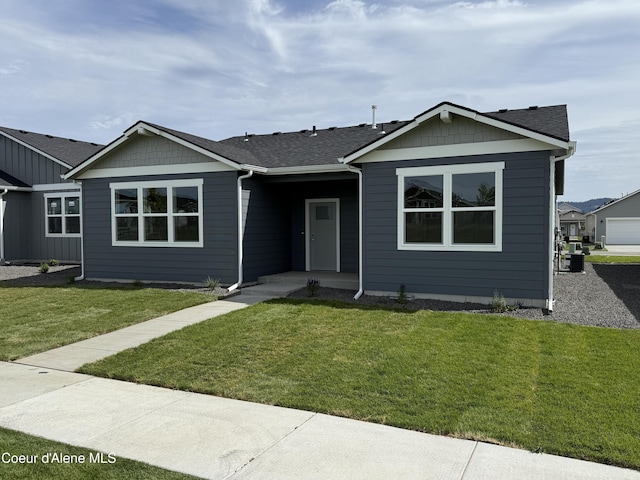 5149 E Rigel Ln, Post Falls, ID 83854 - ranch-style house with a front lawn