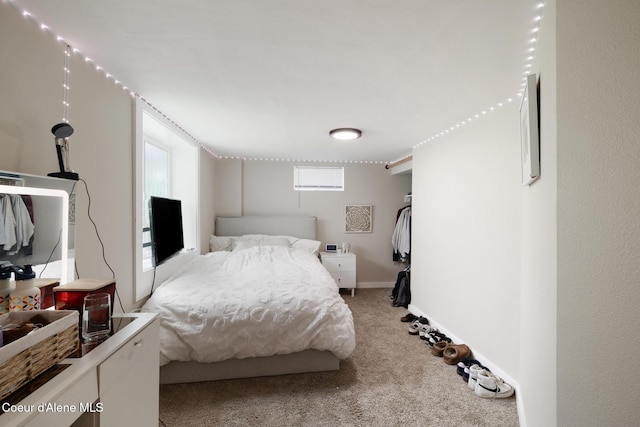 1623 E Boyd Ave, Coeur Dalene, ID 83814 - bedroom featuring light colored carpet and multiple windows