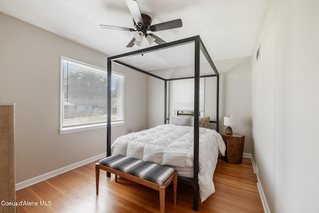 1623 E Boyd Ave, Coeur Dalene, ID 83814 - bedroom featuring wood finished floors and ceiling fan